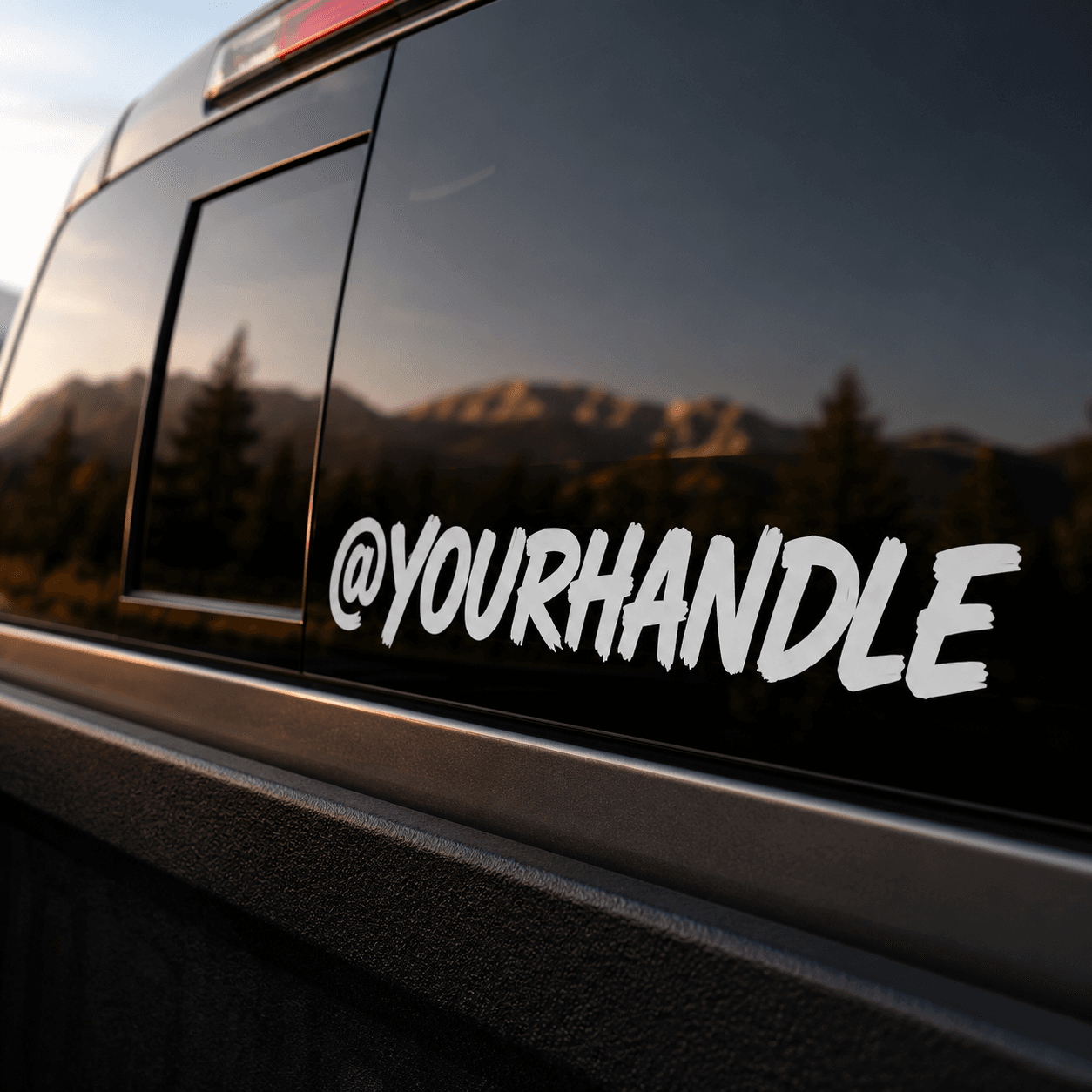 Close up of a crisp outdoor vinyl handle decal on vehicle glass