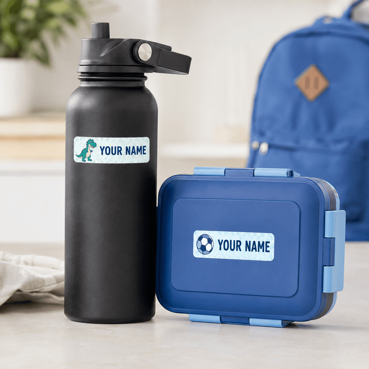 Waterproof name labels on a bottle and lunch box for school gear